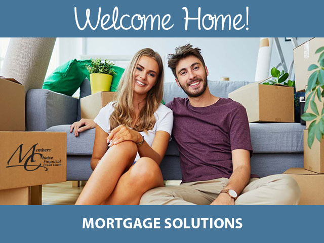 mortgage solutions. couple smiling on couch