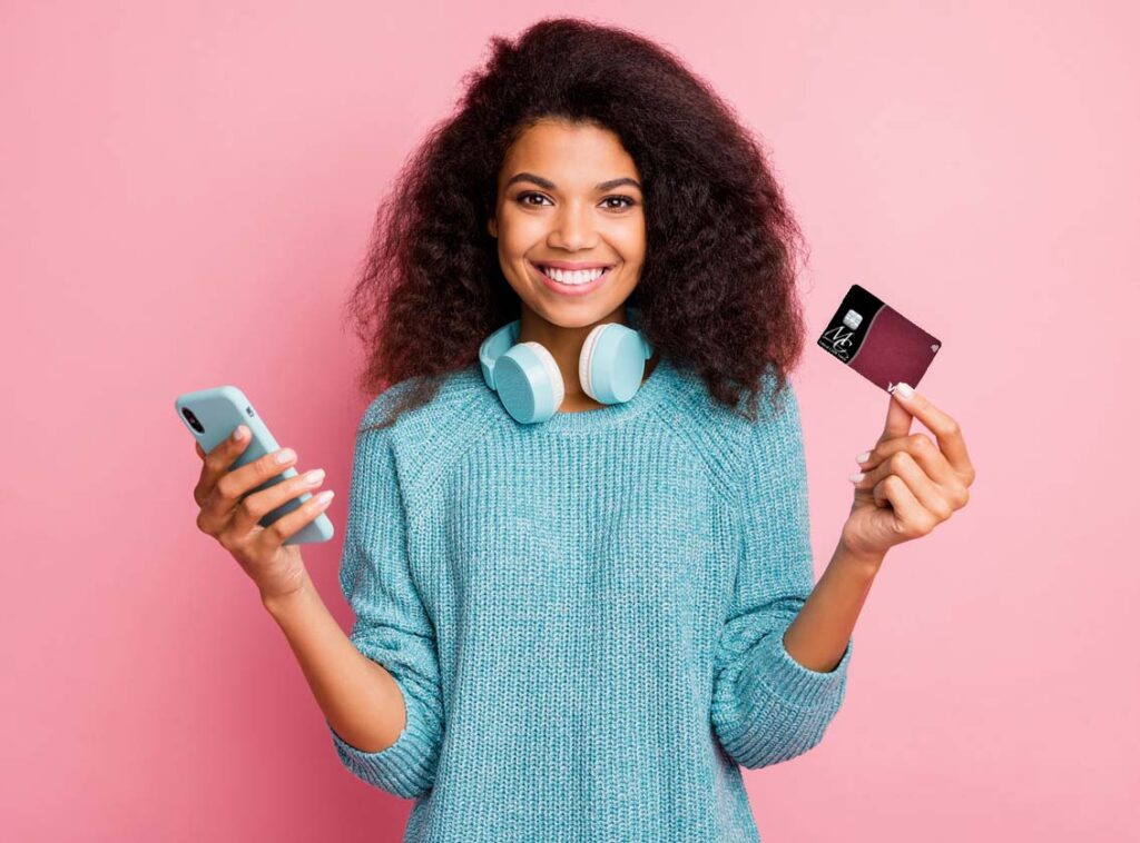 Young Women Holding MC Federal Visa® Debit Card